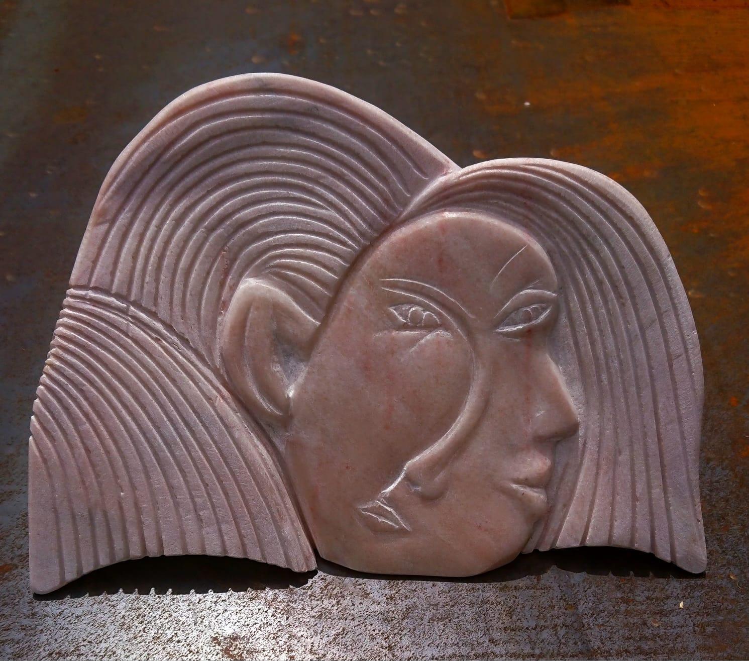 Cabeza de menina picassiana